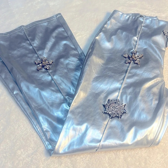 NWT Fashion NOVA Silver Faux Leather Flare Silver Pants w/ Rhinestone Crosses - Picture 3 of 16